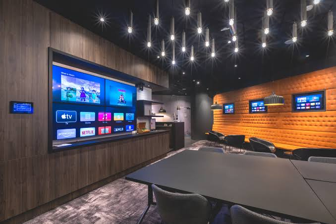 Philips P-Line professional displays installed across a commercial AV and meeting space.