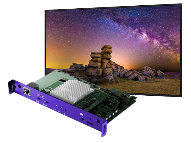 Sharp professional display shown with a Raspberry Pi Compute Module slot-in board positioned in front of the screen.